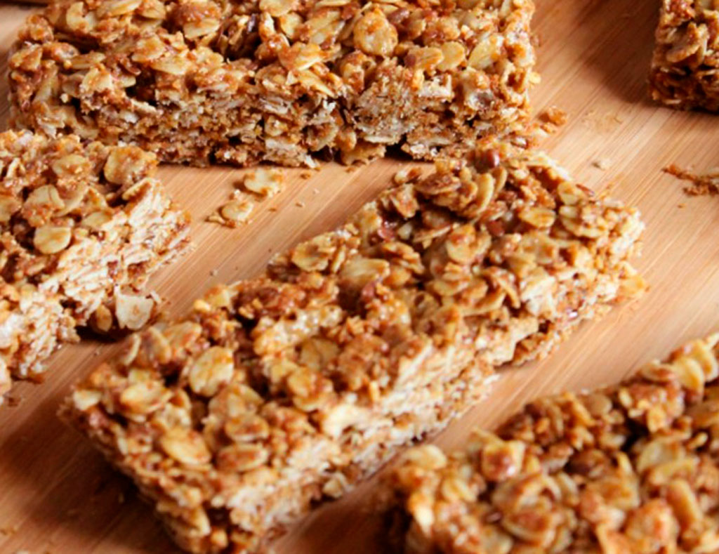 A number of Maple Granola Bars in the light table surface.