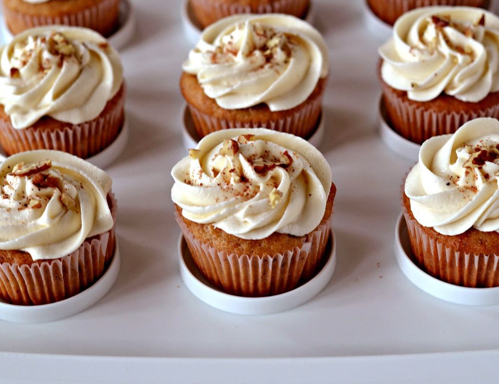 Six Extra Maple Cupcakes with beautiful maple frosting and chopped walnuts.