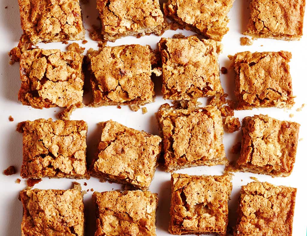 Many Buttermilk Snack Cakes on the white surface.