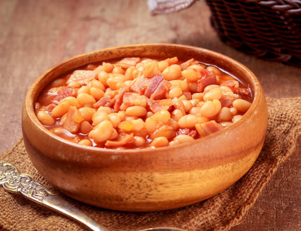 A bowl with juicy Baked Maple Beans.