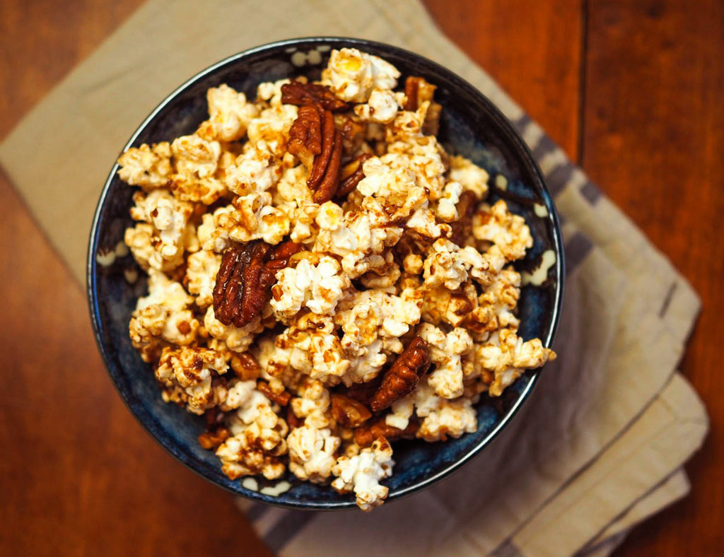 A bowl full of Maple-Pecan Popcorn.